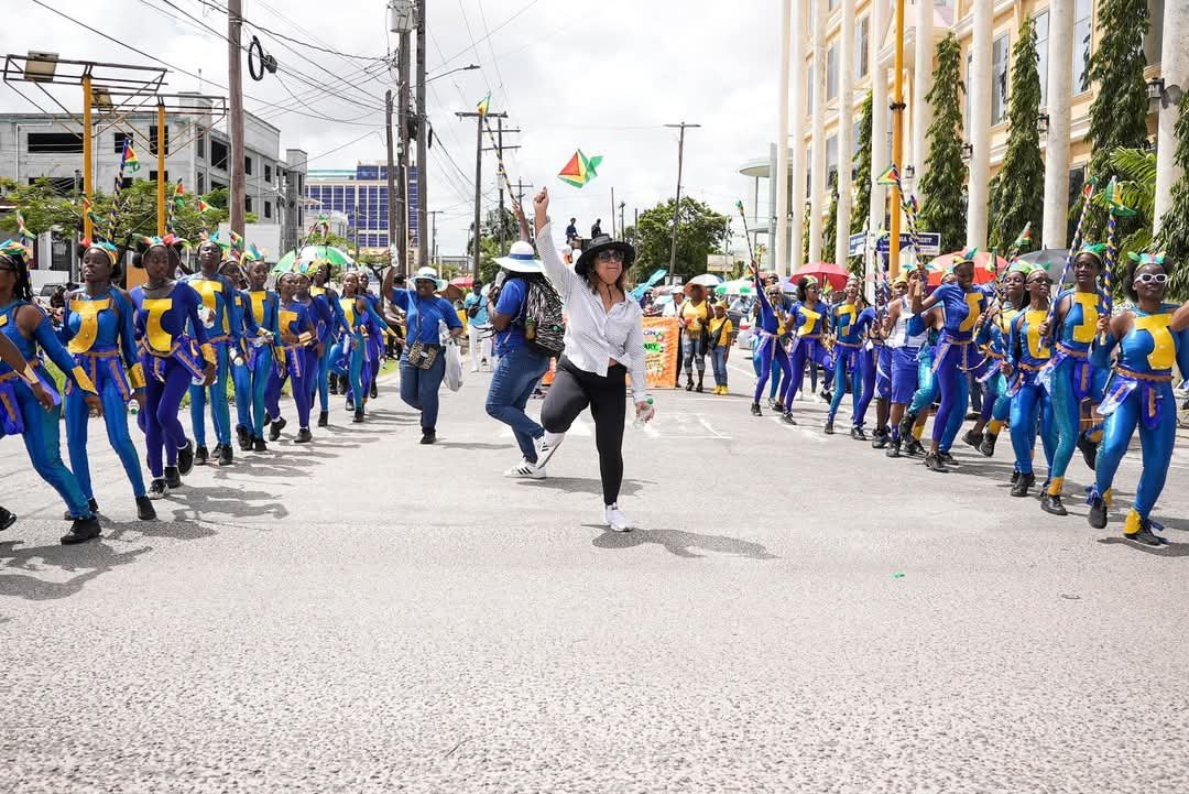 Minister of Education sharing a joyous moment with revelers