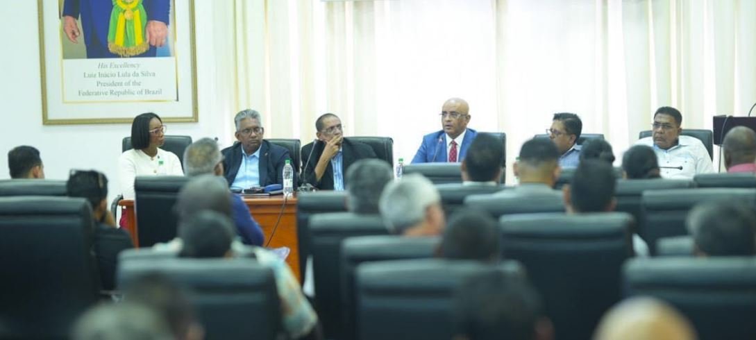 Government and private sector officials during the meeting