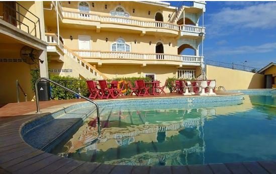Double Day Hotel owner released, barred from leaving Guyana