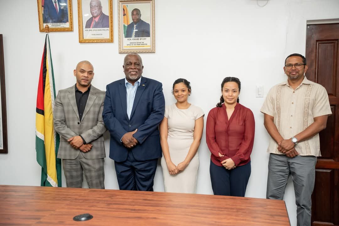 Prime Minister Phillips with representatives Panthera Solutions