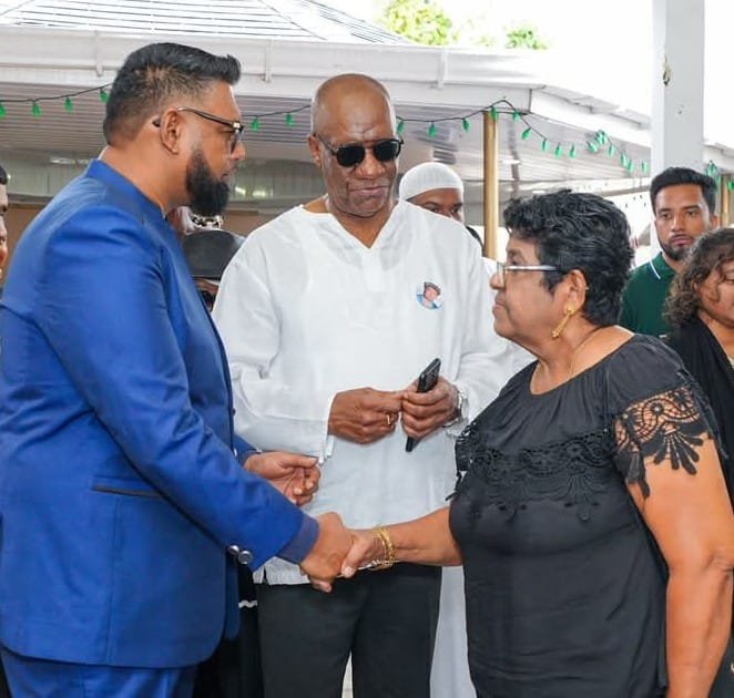 President Ali and longstanding PNC leader Joseph Harmon at Ally's funeral