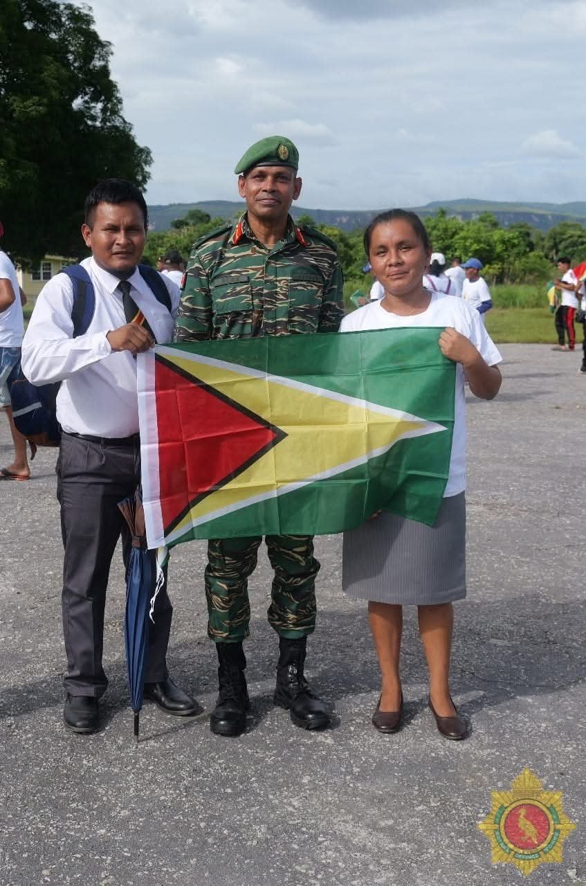 Chief of Defence Staff, Brigadier Omar Khan with residents of Kaikan