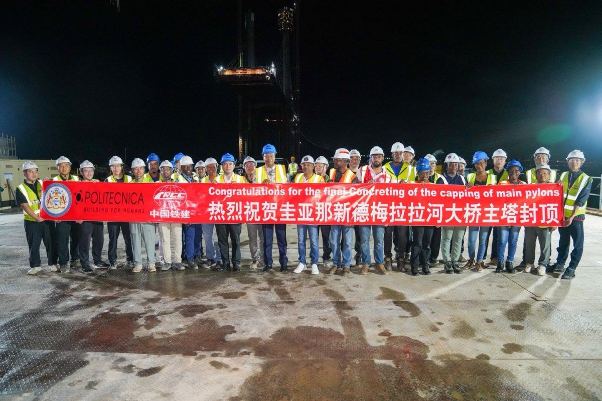 Ministers Edghill and Indar with representatives of the construction company