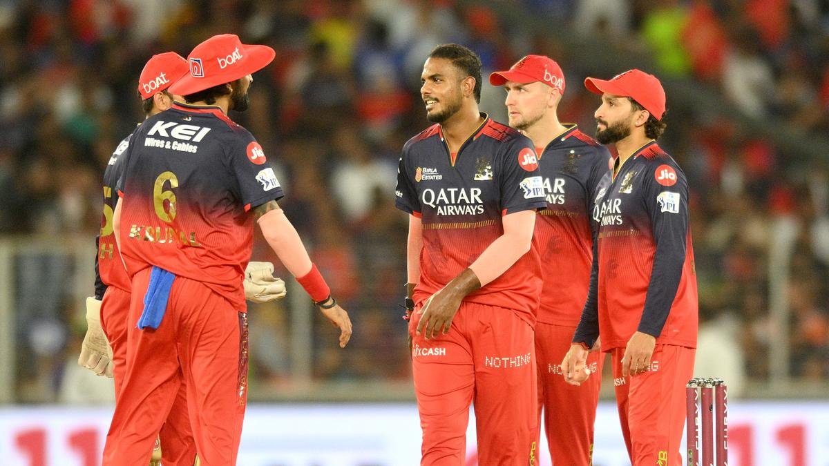 Royal Challengers Bengaluru players celebrate a wicket (The Hindu photo)