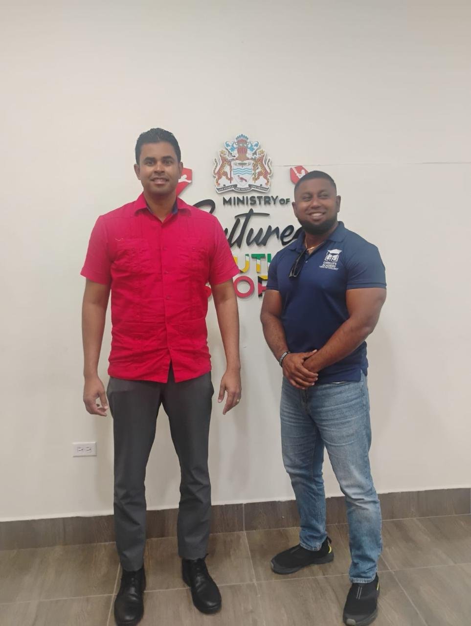Promoter, Videsh Sookram (right), meets Minister Ramson Jr.