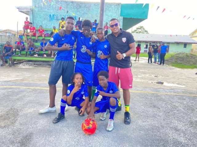 Van Rossum with young footballers (GPF photo)