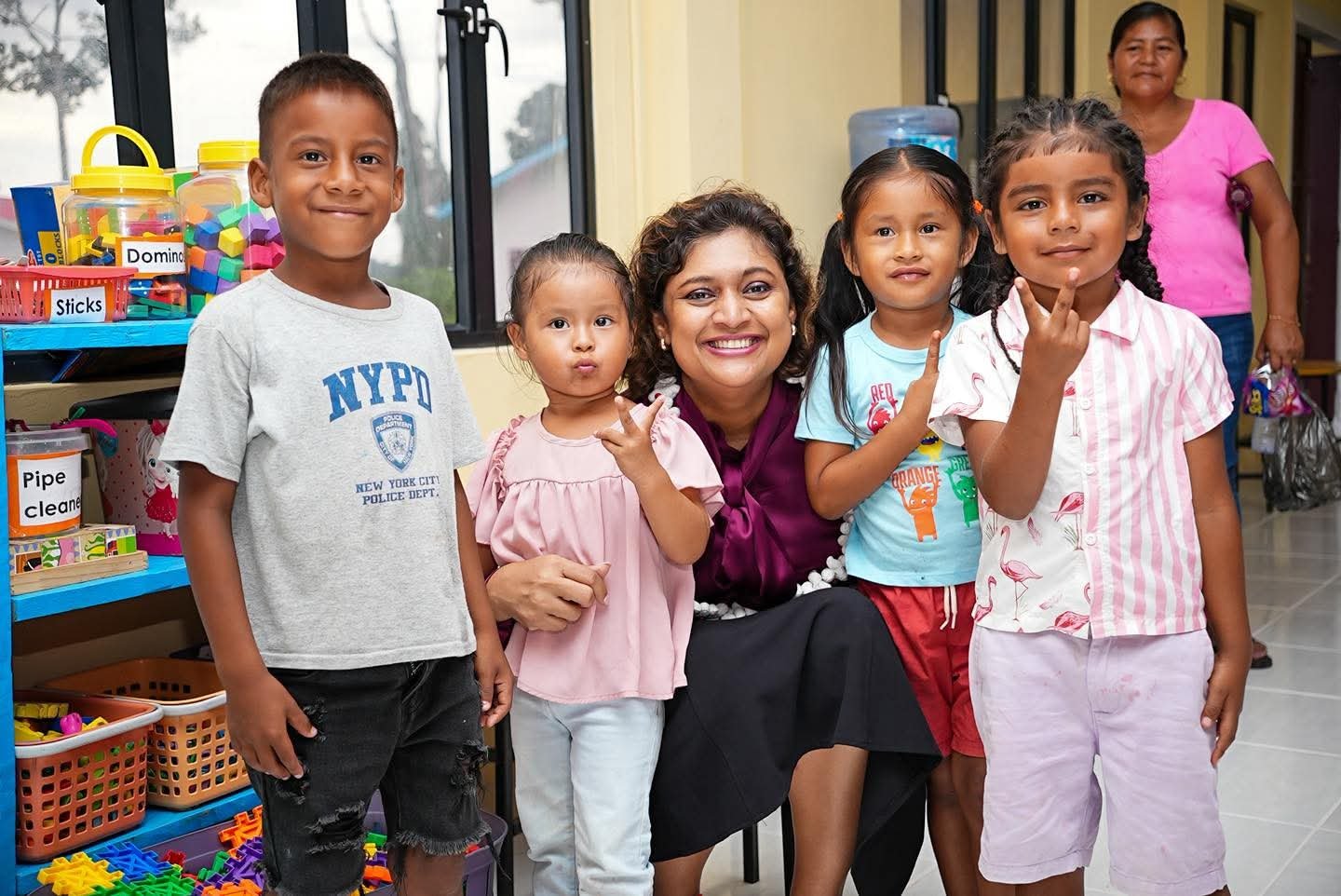 Minister Manickchand with pupils at the school (Education Ministry photo)