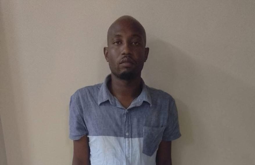 Ex-cop remanded on fraud, forgery charges