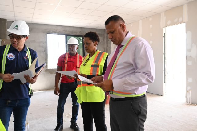 Ministers Benn and Croal during a tour of the work site