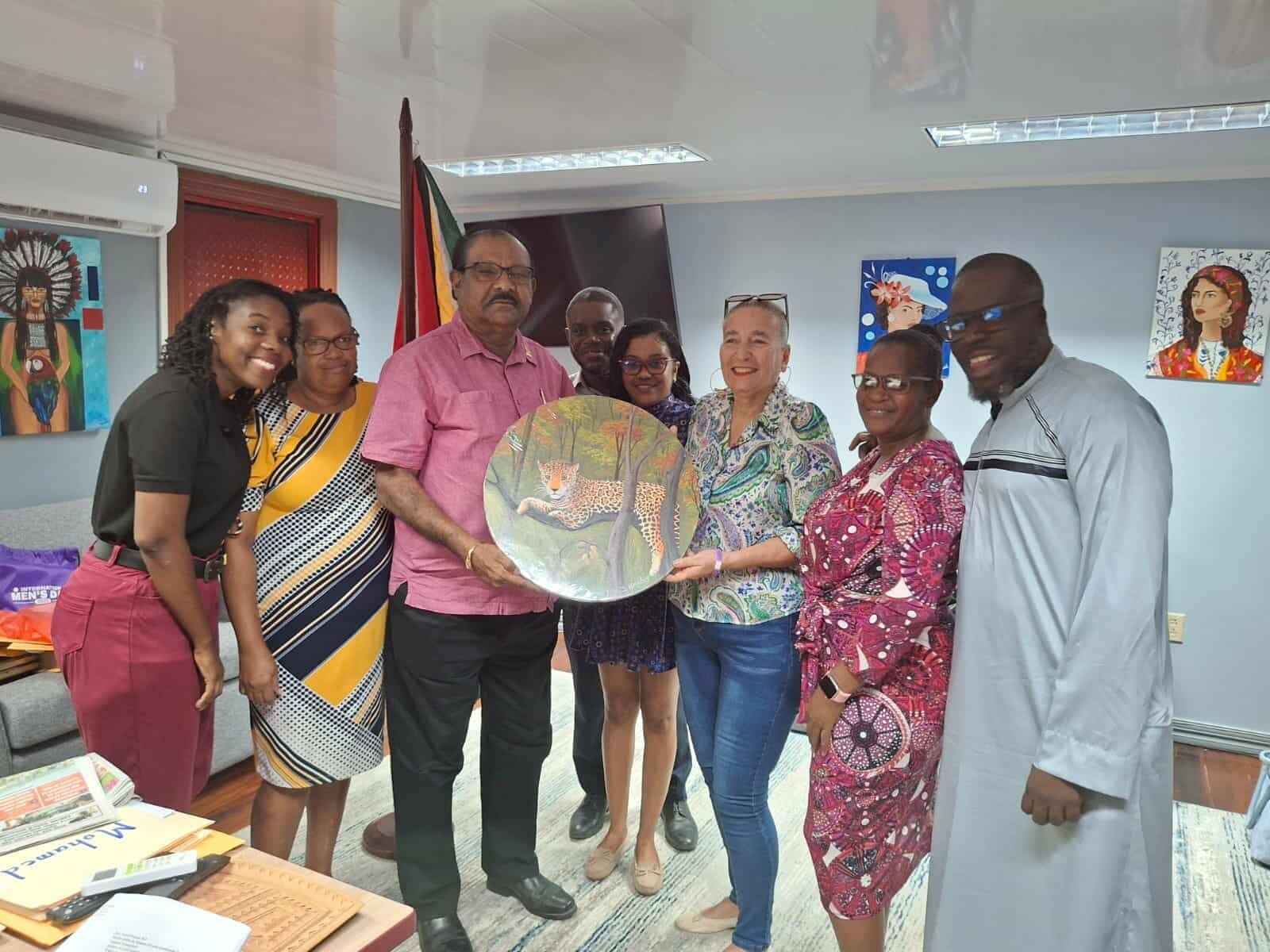 Minister Anand Persaud with CDO members