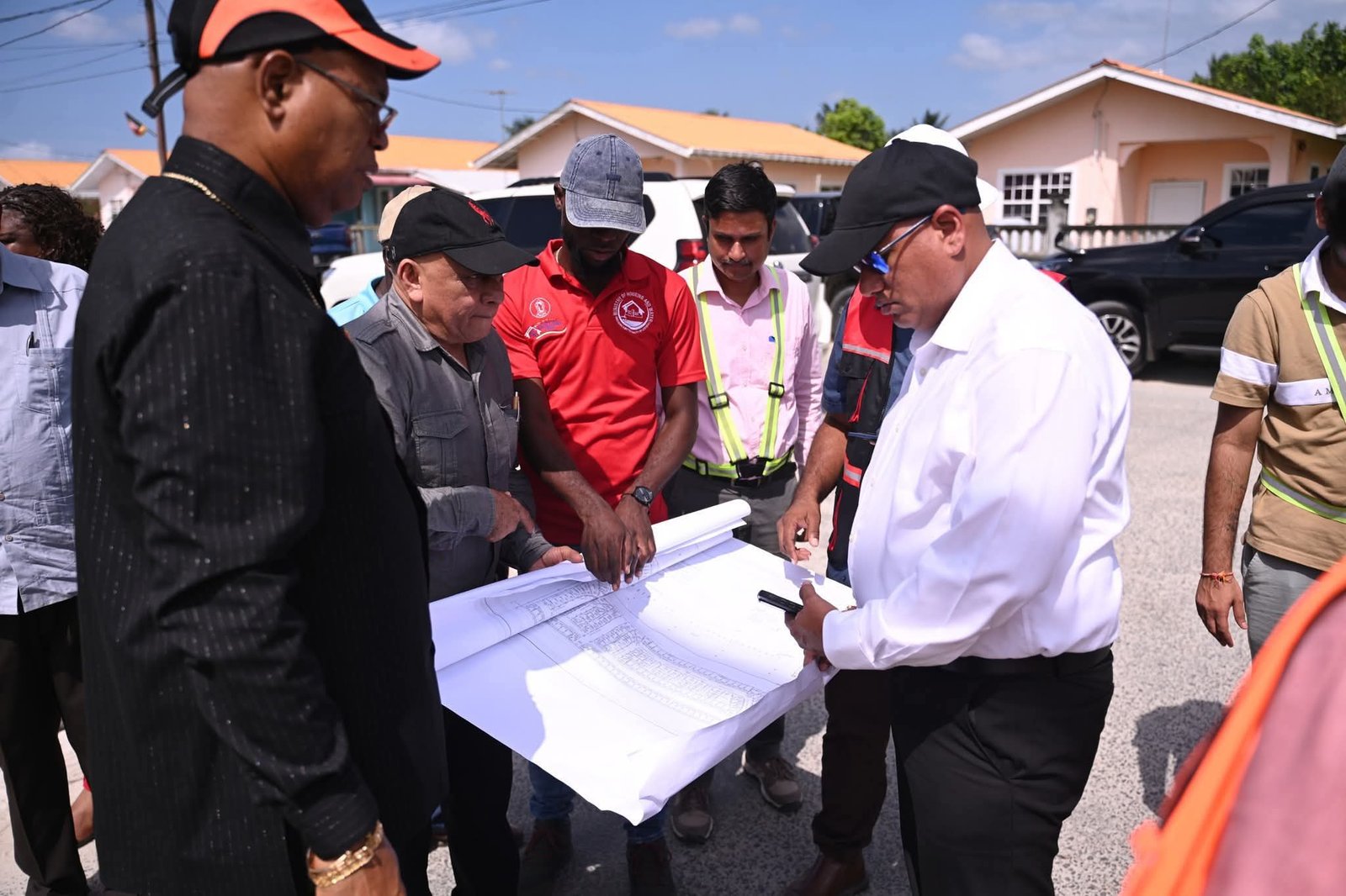 Ministers Croal and Edghill, along with their technical teams, on the site visit