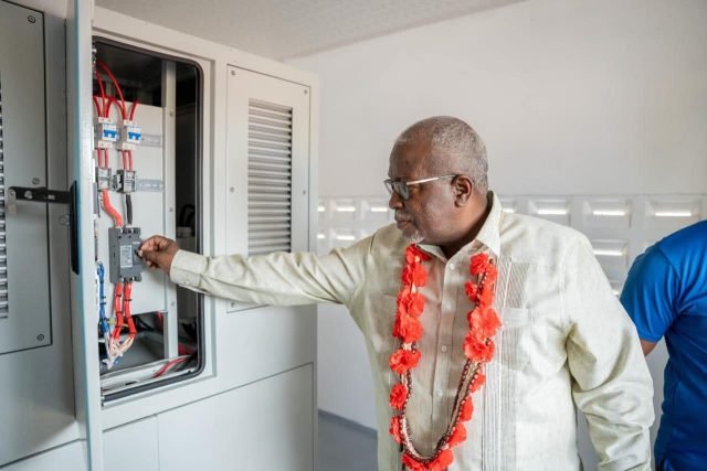 Prime Minister Phillips switches on the grid
