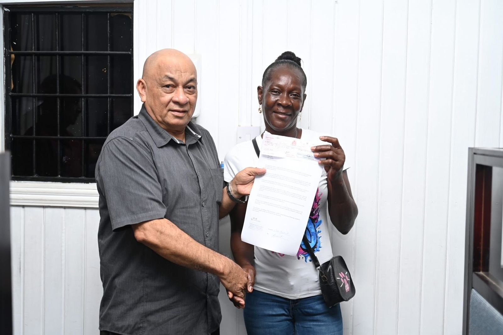Arcadia squatters receive land-ownership papers ahead of Christmas